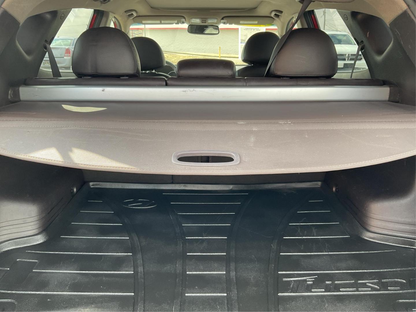 2013 Hyundai Tucson Limited (KM8JU3AC4DU) with an Theta II 2.4L I-4 DOHC engine, located at 1099 N County Rd 25A, Troy, OH, 45373, (937) 908-9800, 40.057079, -84.212883 - 2013 Hyundai Tucson Limited - Photo#10