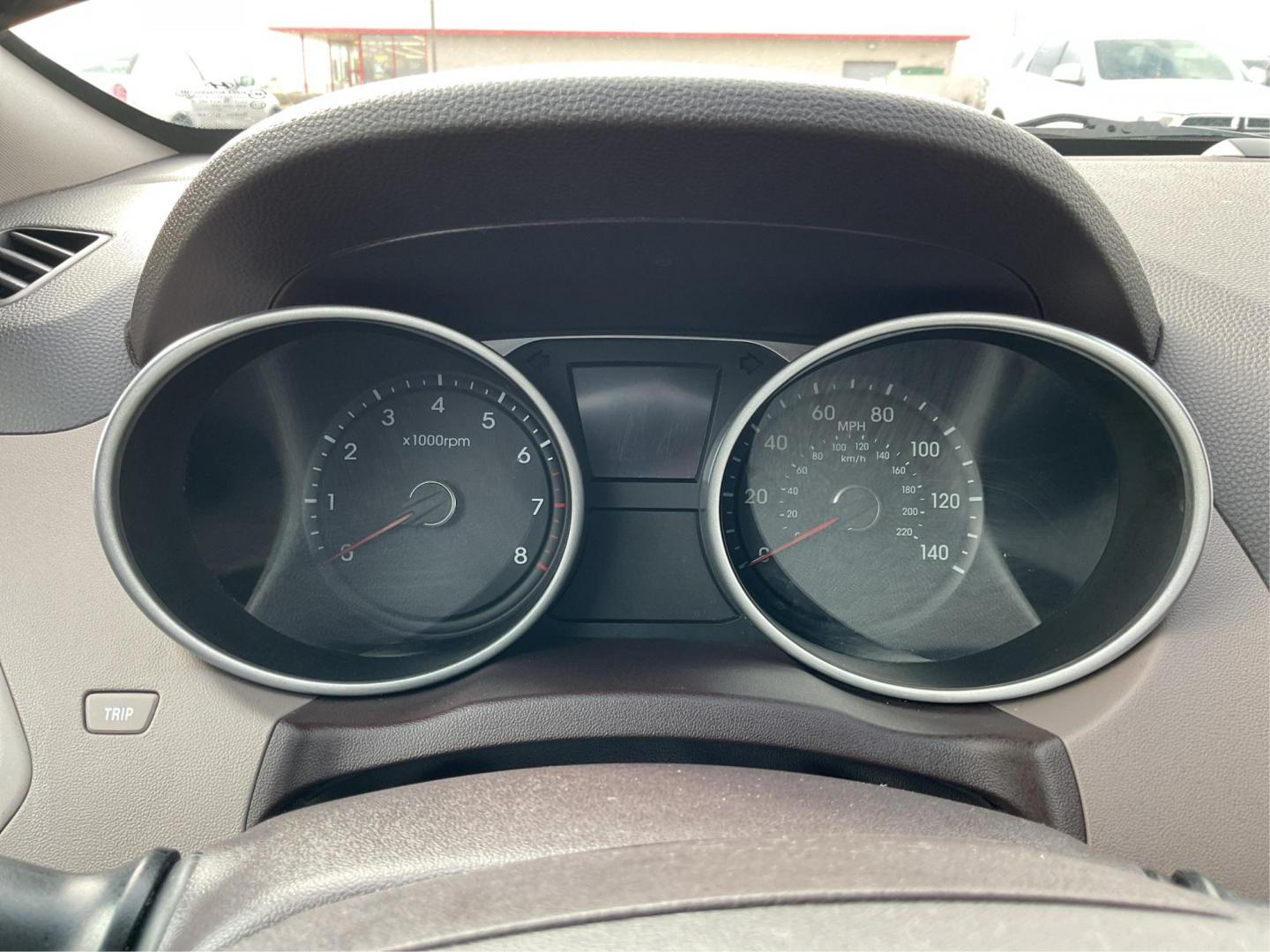 2013 Hyundai Tucson Limited (KM8JU3AC4DU) with an Theta II 2.4L I-4 DOHC engine, located at 1099 N County Rd 25A, Troy, OH, 45373, (937) 908-9800, 40.057079, -84.212883 - 2013 Hyundai Tucson Limited - Photo#13