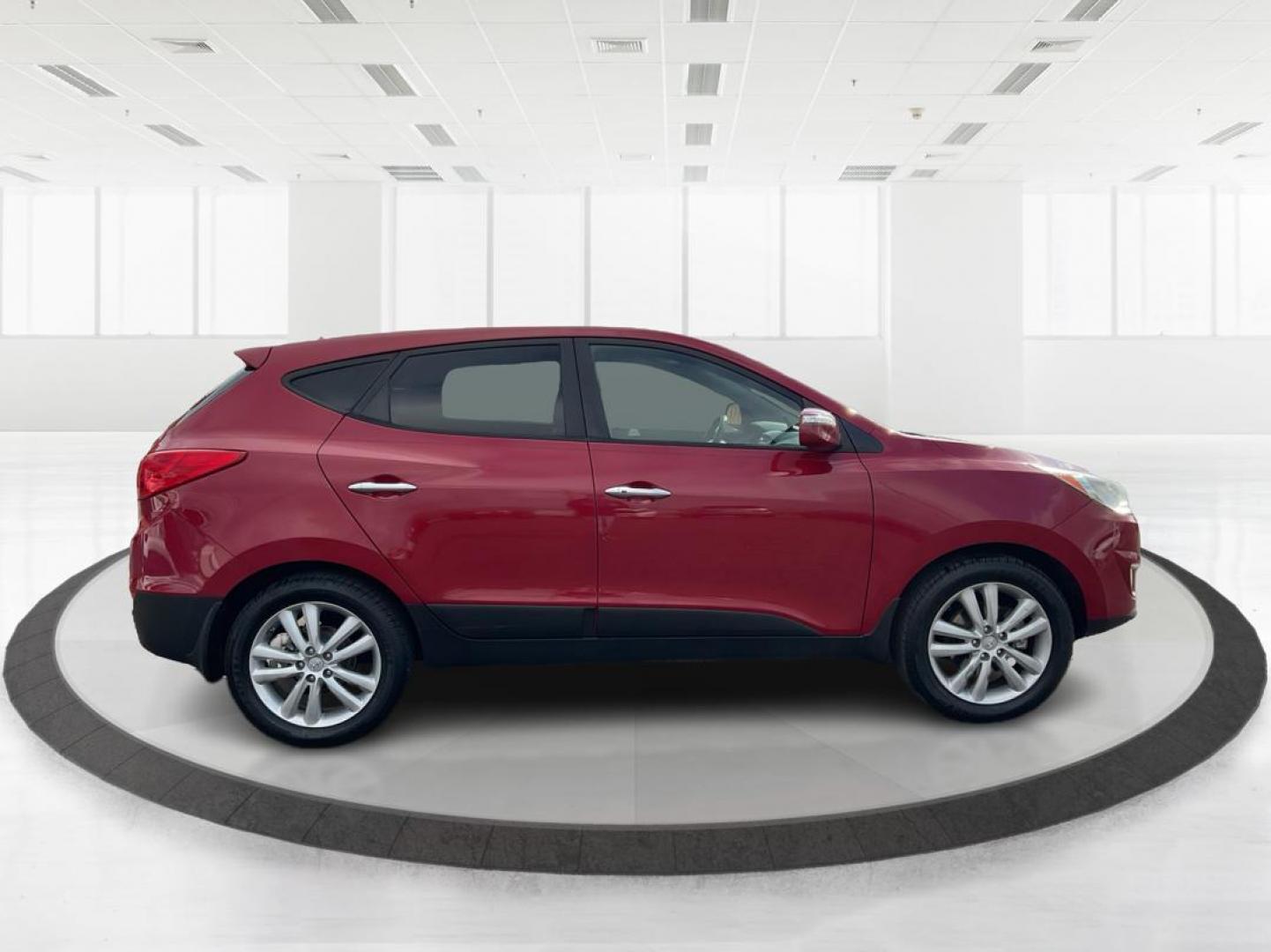 2013 Hyundai Tucson Limited (KM8JU3AC4DU) with an Theta II 2.4L I-4 DOHC engine, located at 1099 N County Rd 25A, Troy, OH, 45373, (937) 908-9800, 40.057079, -84.212883 - 2013 Hyundai Tucson Limited - Photo#1