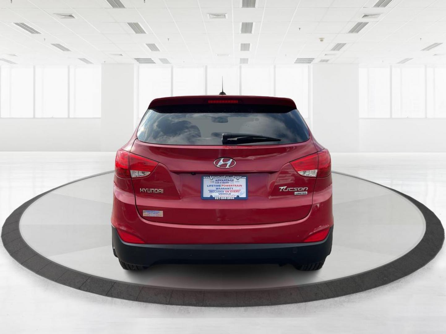 2013 Hyundai Tucson Limited (KM8JU3AC4DU) with an Theta II 2.4L I-4 DOHC engine, located at 1099 N County Rd 25A, Troy, OH, 45373, (937) 908-9800, 40.057079, -84.212883 - 2013 Hyundai Tucson Limited - Photo#2