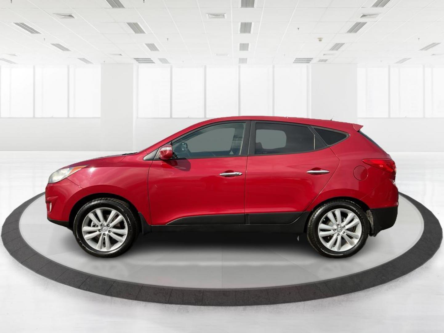 2013 Hyundai Tucson Limited (KM8JU3AC4DU) with an Theta II 2.4L I-4 DOHC engine, located at 1099 N County Rd 25A, Troy, OH, 45373, (937) 908-9800, 40.057079, -84.212883 - 2013 Hyundai Tucson Limited - Photo#4