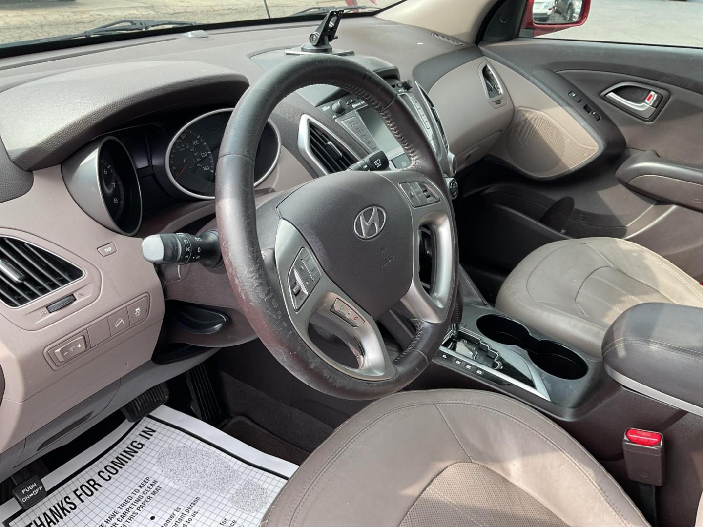 2013 Hyundai Tucson Limited (KM8JU3AC4DU) with an Theta II 2.4L I-4 DOHC engine, located at 1099 N County Rd 25A, Troy, OH, 45373, (937) 908-9800, 40.057079, -84.212883 - 2013 Hyundai Tucson Limited - Photo#7