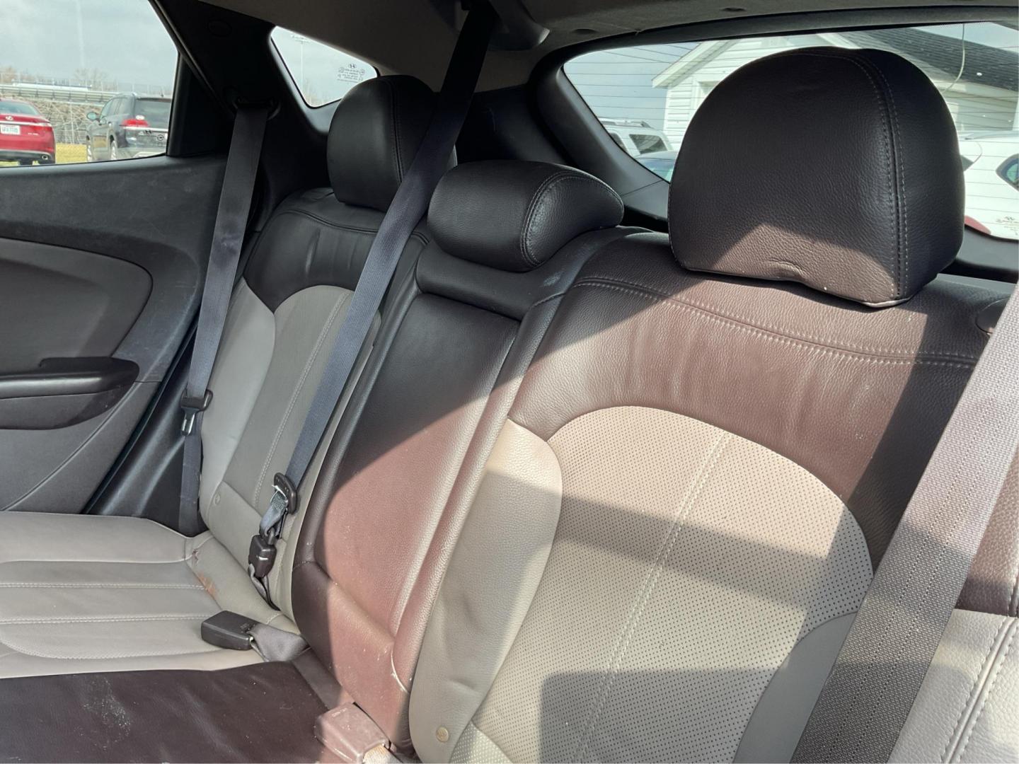 2013 Hyundai Tucson Limited (KM8JU3AC4DU) with an Theta II 2.4L I-4 DOHC engine, located at 1099 N County Rd 25A, Troy, OH, 45373, (937) 908-9800, 40.057079, -84.212883 - 2013 Hyundai Tucson Limited - Photo#8