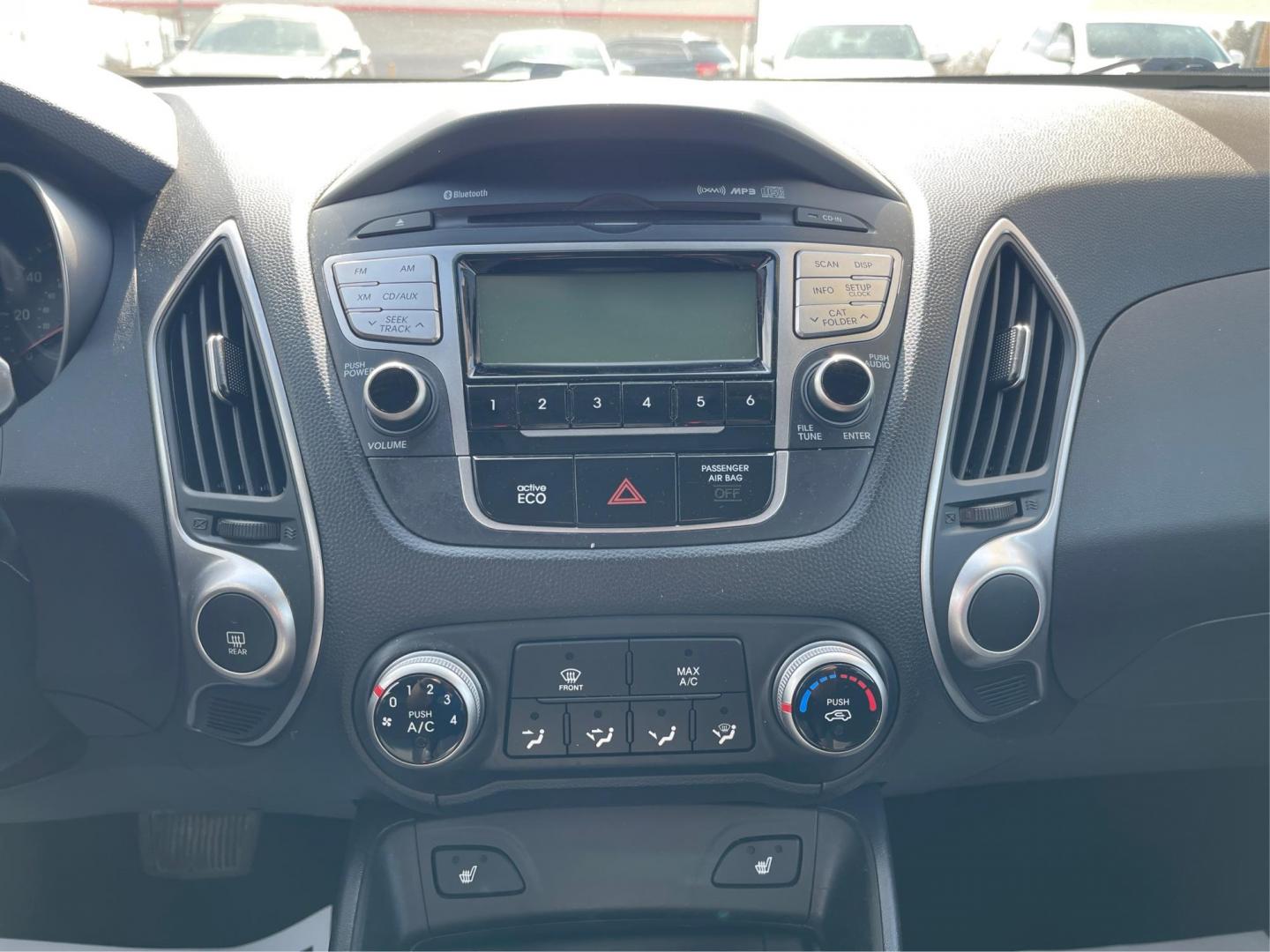 2013 Hyundai Tucson GLS (KM8JU3AC1DU) with an Theta II 2.4L I-4 DOHC engine, located at 1099 N County Rd 25A, Troy, OH, 45373, (937) 908-9800, 40.057079, -84.212883 - 2013 Hyundai Tucson GLS - Photo#12