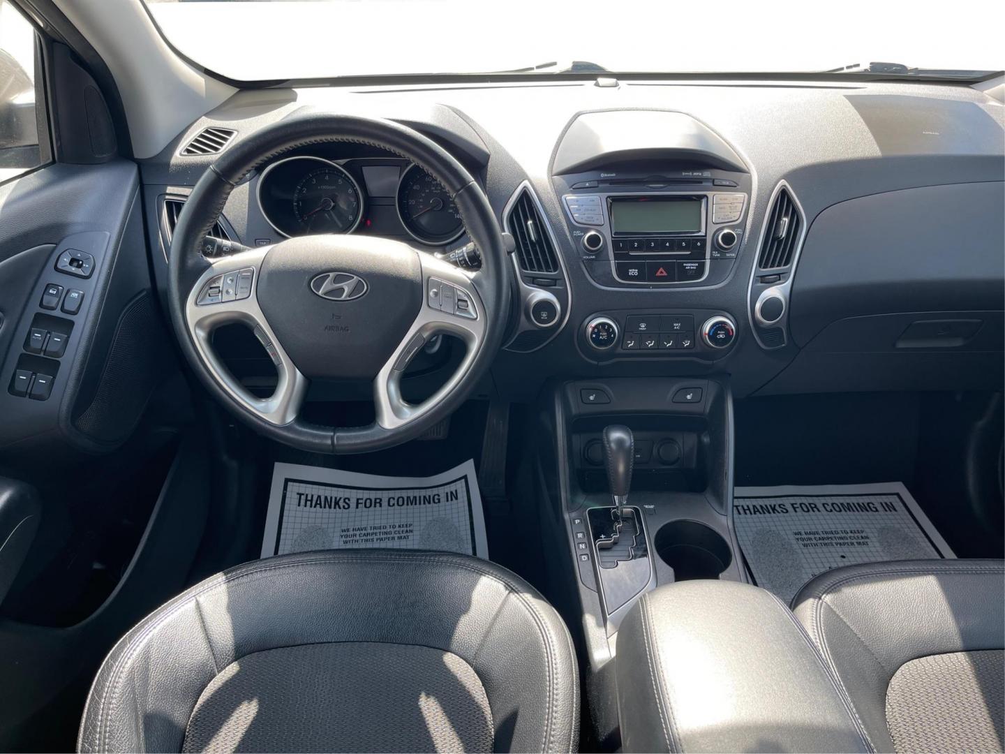 2013 Hyundai Tucson GLS (KM8JU3AC1DU) with an Theta II 2.4L I-4 DOHC engine, located at 1099 N County Rd 25A, Troy, OH, 45373, (937) 908-9800, 40.057079, -84.212883 - 2013 Hyundai Tucson GLS - Photo#20