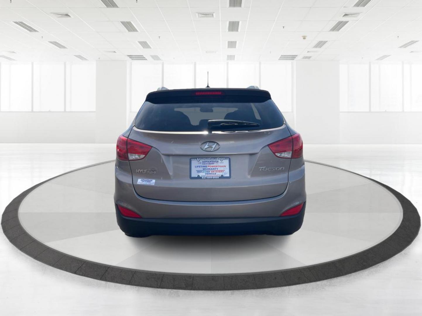 2013 Hyundai Tucson GLS (KM8JU3AC1DU) with an Theta II 2.4L I-4 DOHC engine, located at 1099 N County Rd 25A, Troy, OH, 45373, (937) 908-9800, 40.057079, -84.212883 - 2013 Hyundai Tucson GLS - Photo#3