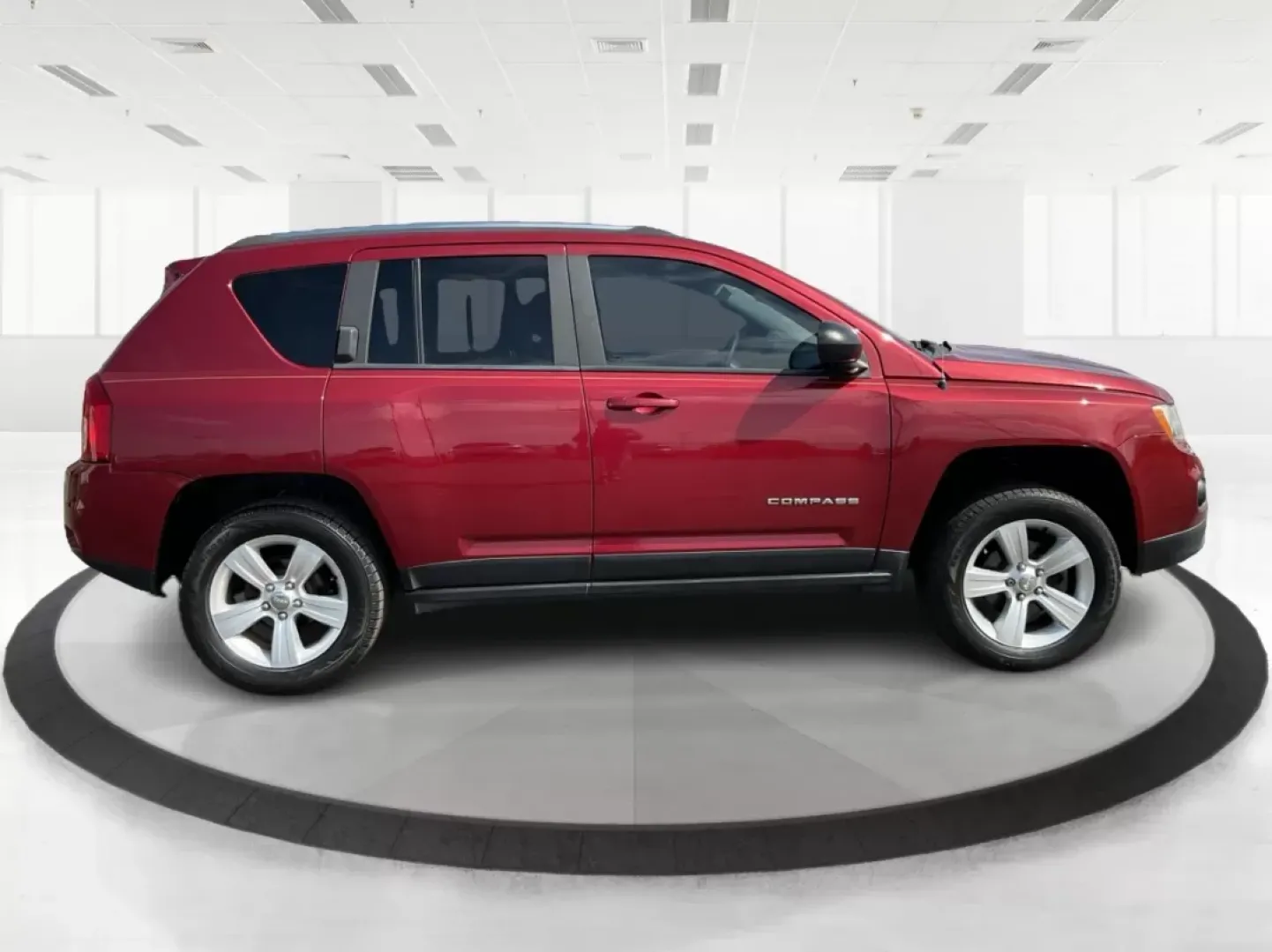 2013 Jeep Compass Latitude (1C4NJDEB6DD) with an 2.4L I-4 DOHC engine, located at 401 Woodman Dr, Riverside, OH, 45431, (937) 908-9800, 39.760899, -84.123421 - Are you ready to elevate your adventures and embrace a lifestyle filled with exploration? The 2013 Jeep Compass Latitude is the perfect companion for those who value versatility and comfort, making it an ideal choice for weekend getaways or daily commutes. This rugged yet refined SUV is now availabl - Photo#1