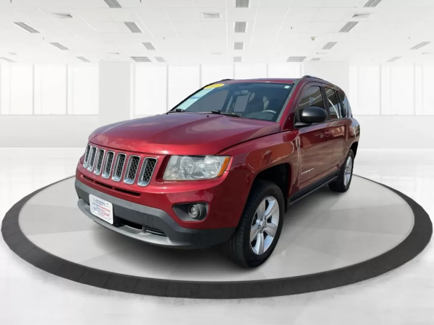2013 Jeep Compass Latitude (1C4NJDEB6DD) with an 2.4L I-4 DOHC engine, located at 401 Woodman Dr, Riverside, OH, 45431, (937) 908-9800, 39.760899, -84.123421 - Are you ready to elevate your adventures and embrace a lifestyle filled with exploration? The 2013 Jeep Compass Latitude is the perfect companion for those who value versatility and comfort, making it an ideal choice for weekend getaways or daily commutes. This rugged yet refined SUV is now availabl - Photo#7