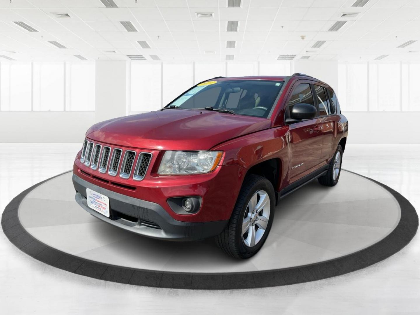 2013 Jeep Compass Latitude (1C4NJDEB6DD) with an 2.4L I-4 DOHC engine, located at 1184 Kauffman Ave, Fairborn, OH, 45324, (937) 908-9800, 39.807072, -84.030914 - 2013 Jeep Compass Latitude - Photo#6