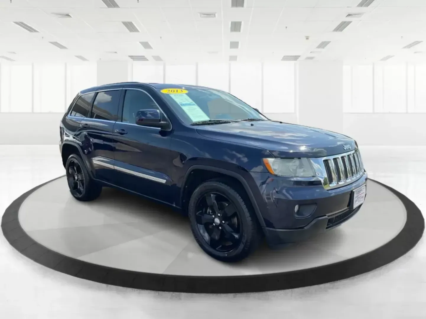 2013 Jeep Grand Cherokee Laredo (1C4RJFAG7DC) with an Other engine, located at 1951 S Dayton Lakeview Rd., New Carlisle, OH, 45344, (937) 908-9800, 39.890999, -84.050255 - **Unleash Adventure with the 2013 Jeep Grand Cherokee Laredo Your Perfect SUV Awaits!**<br /> <br /> Are you ready to elevate your lifestyle and embrace thrilling weekend adventures? The 2013 Jeep Grand Cherokee Laredo, available at Advantage Car and Credit in Fairborn, OH, is the ideal vehicle for - Photo#0