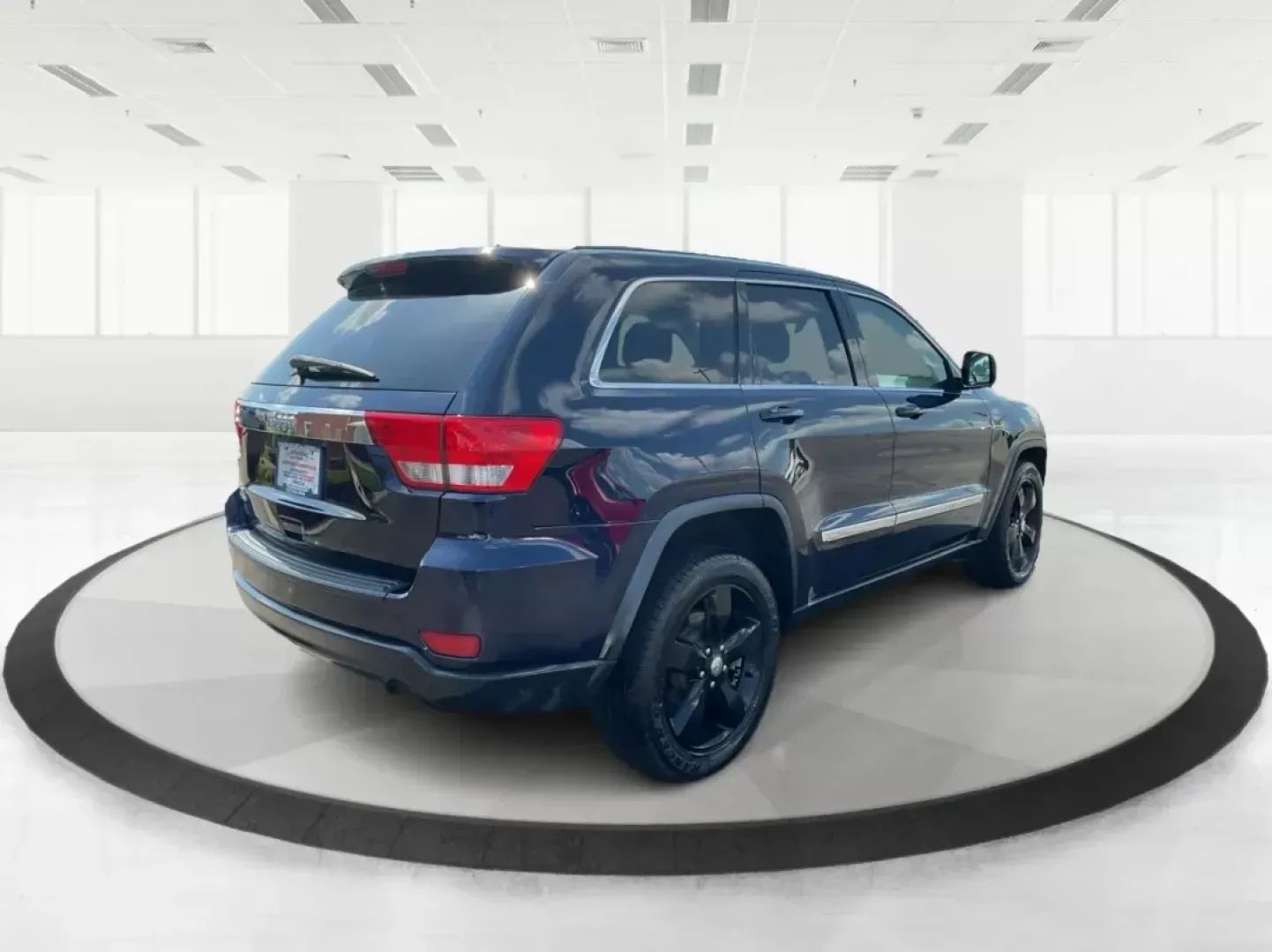 2013 Jeep Grand Cherokee Laredo (1C4RJFAG7DC) with an Other engine, located at 1951 S Dayton Lakeview Rd., New Carlisle, OH, 45344, (937) 908-9800, 39.890999, -84.050255 - **Unleash Adventure with the 2013 Jeep Grand Cherokee Laredo Your Perfect SUV Awaits!**<br /> <br /> Are you ready to elevate your lifestyle and embrace thrilling weekend adventures? The 2013 Jeep Grand Cherokee Laredo, available at Advantage Car and Credit in Fairborn, OH, is the ideal vehicle for - Photo#2