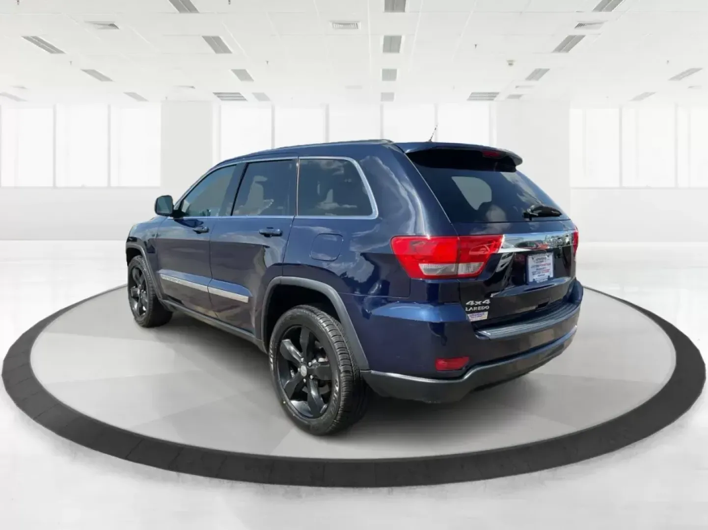 2013 Jeep Grand Cherokee Laredo (1C4RJFAG7DC) with an Other engine, located at 1951 S Dayton Lakeview Rd., New Carlisle, OH, 45344, (937) 908-9800, 39.890999, -84.050255 - **Unleash Adventure with the 2013 Jeep Grand Cherokee Laredo Your Perfect SUV Awaits!**<br /> <br /> Are you ready to elevate your lifestyle and embrace thrilling weekend adventures? The 2013 Jeep Grand Cherokee Laredo, available at Advantage Car and Credit in Fairborn, OH, is the ideal vehicle for - Photo#4