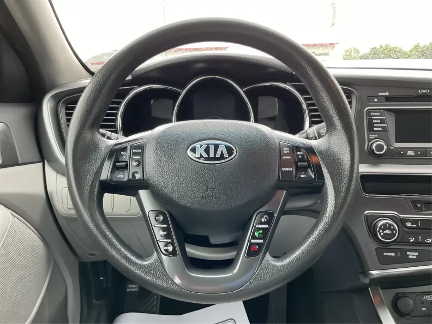 2013 Kia Optima LX (5XXGM4A72DG) with an 2.4L I-4 gasoline direct injection engine, located at 401 Woodman Dr, Riverside, OH, 45431, (937) 908-9800, 39.760899, -84.123421 - **Unlock Adventure with the 2013 Kia Optima LX at Advantage Car and Credit!**<br /> <br /> Are you searching for a reliable sedan that seamlessly combines comfort, style, and affordability? Look no further! The 2013 Kia Optima LX is the perfect vehicle for budget-conscious buyers, offering a great b - Photo#14