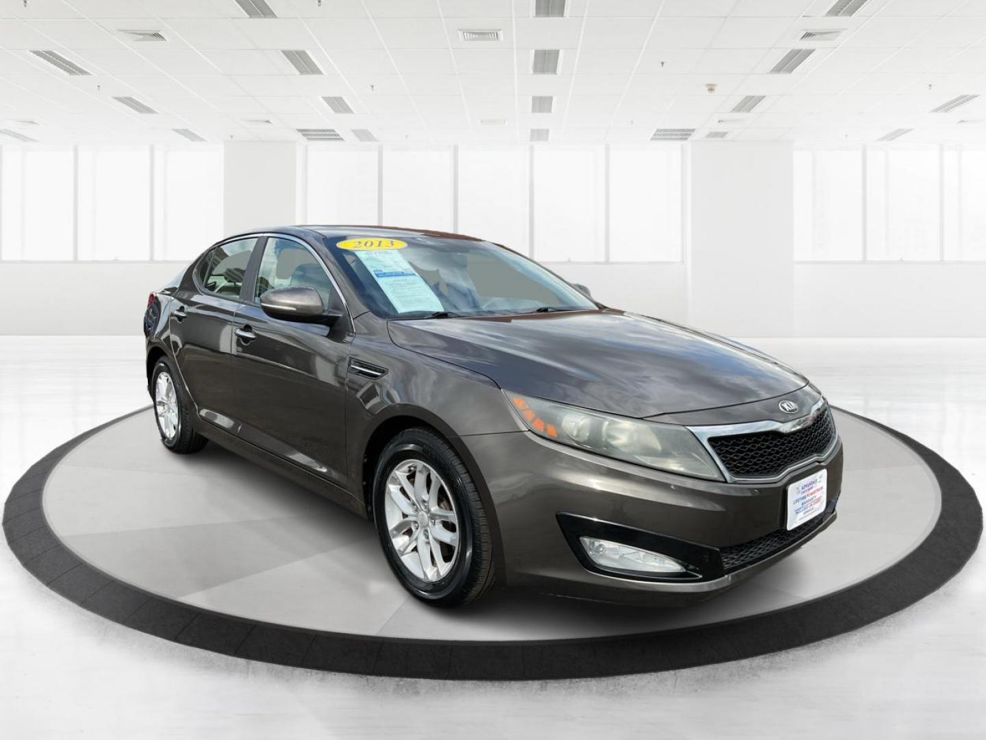 2013 Kia Optima LX (5XXGM4A71DG) with an 2.4L I-4 gasoline direct injection engine, located at 880 E. National Road, Vandalia, OH, 45377, (937) 908-9800, 39.891918, -84.183594 - 2013 Kia Optima LX - Photo#0