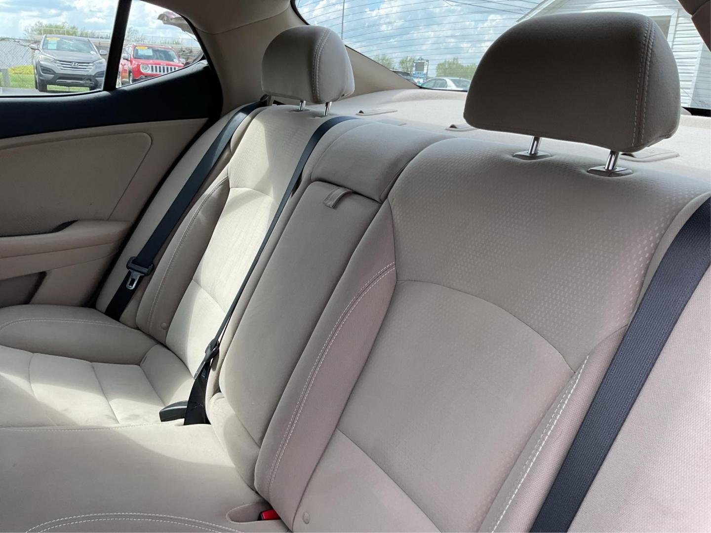 2013 Kia Optima LX (5XXGM4A71DG) with an 2.4L I-4 gasoline direct injection engine, located at 880 E. National Road, Vandalia, OH, 45377, (937) 908-9800, 39.891918, -84.183594 - 2013 Kia Optima LX - Photo#9