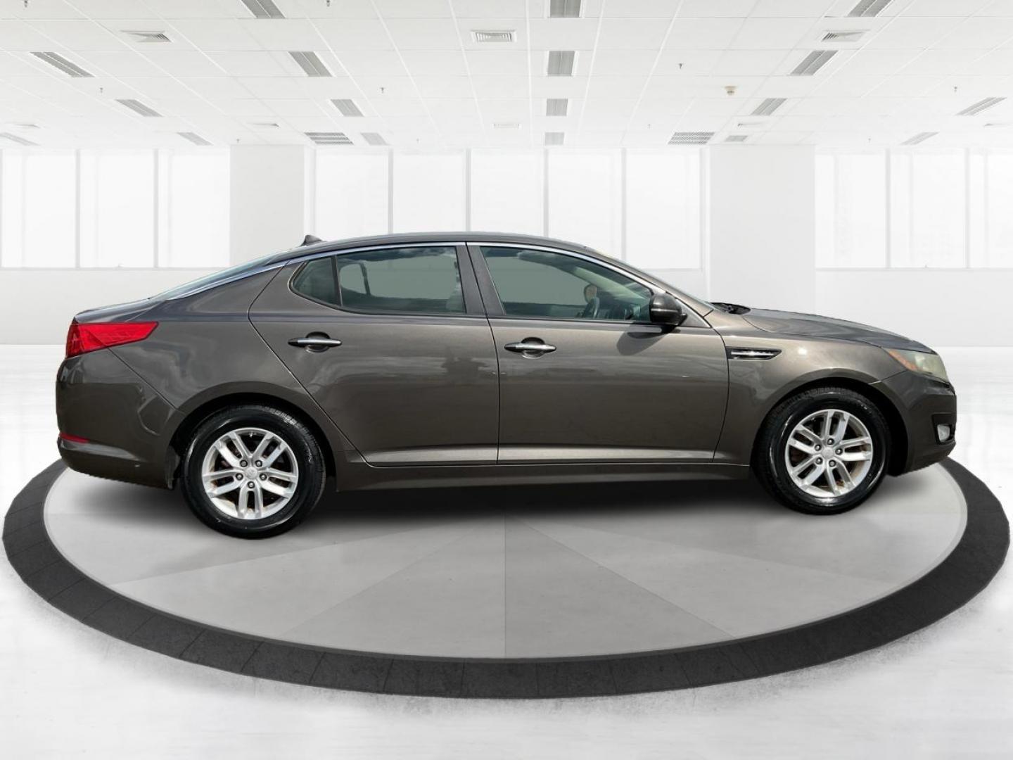 2013 Kia Optima LX (5XXGM4A71DG) with an 2.4L I-4 gasoline direct injection engine, located at 880 E. National Road, Vandalia, OH, 45377, (937) 908-9800, 39.891918, -84.183594 - 2013 Kia Optima LX - Photo#1