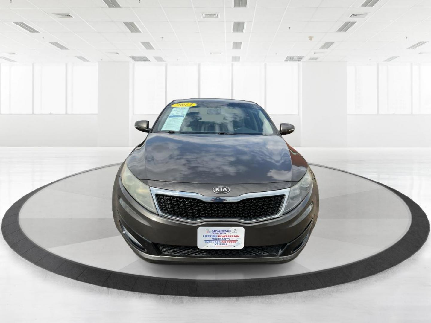 2013 Kia Optima LX (5XXGM4A71DG) with an 2.4L I-4 gasoline direct injection engine, located at 880 E. National Road, Vandalia, OH, 45377, (937) 908-9800, 39.891918, -84.183594 - 2013 Kia Optima LX - Photo#6