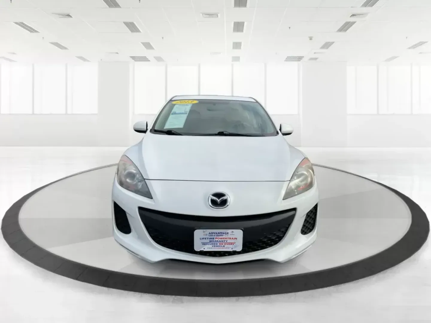 2013 Mazda Mazda3 i SV (JM1BL1TF0D1) with an 2L I-4 DOHC engine, located at 1184 Kauffman Ave, Fairborn, OH, 45324, (937) 908-9800, 39.807072, -84.030914 - 2013 Mazda Mazda3 i SV - Photo#7
