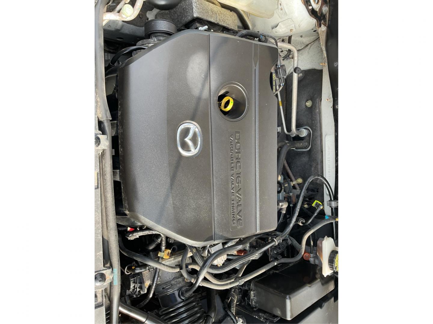 2013 Mazda Mazda3 i SV (JM1BL1TF0D1) with an 2L I-4 DOHC engine, located at 1951 S Dayton Lakeview Rd., New Carlisle, OH, 45344, (937) 908-9800, 39.890999, -84.050255 - 2013 Mazda Mazda3 i SV - Photo#10