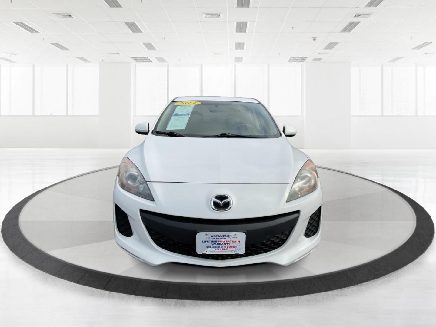 2013 Mazda Mazda3 i SV (JM1BL1TF0D1) with an 2L I-4 DOHC engine, located at 1951 S Dayton Lakeview Rd., New Carlisle, OH, 45344, (937) 908-9800, 39.890999, -84.050255 - 2013 Mazda Mazda3 i SV - Photo#6