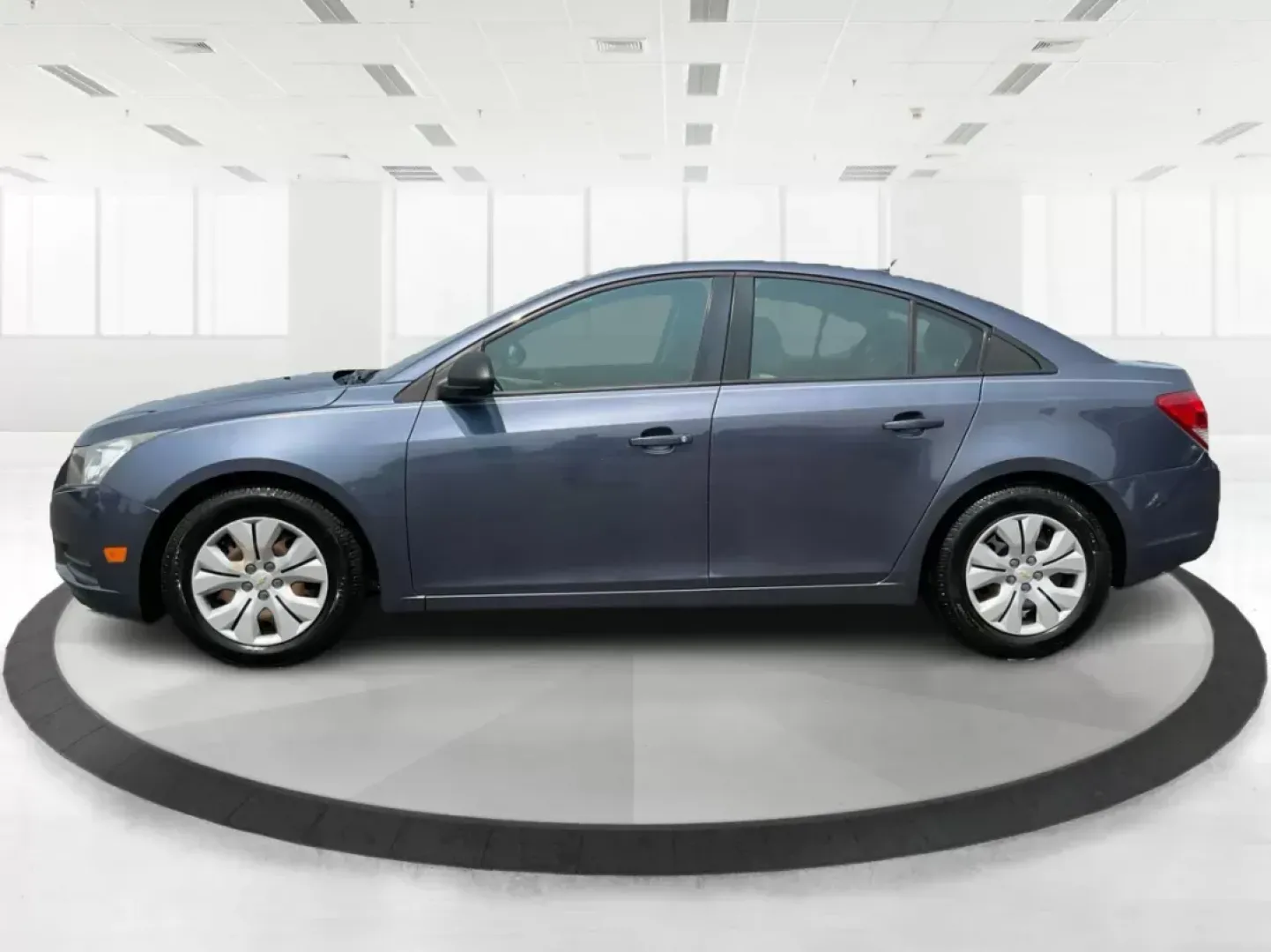 2014 Chevrolet Cruze LS Auto (1G1PA5SH3E7) with an ECOTEC 1.8L I-4 DOHC engine, located at 1951 S Dayton Lakeview Rd., New Carlisle, OH, 45344, (937) 908-9800, 39.890999, -84.050255 - **Experience the Journey: 2014 Chevrolet Cruze LS at Advantage Car and Credit**<br /> <br /> If you're on the hunt for a reliable vehicle that perfectly balances style, comfort, and functionality, look no further than the 2014 Chevrolet Cruze LS. This sedan is not just a mode of transportation; it's - Photo#5