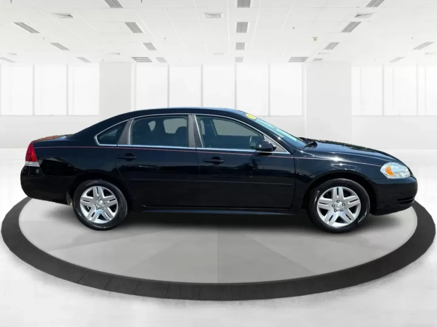 2014 Chevrolet Impala Limited LT (2G1WB5E3XE1) with an 3.6L V-6 gasoline direct injection engine, located at 1951 S Dayton Lakeview Rd., New Carlisle, OH, 45344, (937) 908-9800, 39.890999, -84.050255 - Are you ready for your next adventure, whether it's a family road trip, a daily commute, or simply running errands around Fairborn? The 2014 Chevrolet Impala Limited LT is the perfect sedan to elevate your driving experience. With its stylish black exterior and reliable performance, this vehicle is - Photo#1