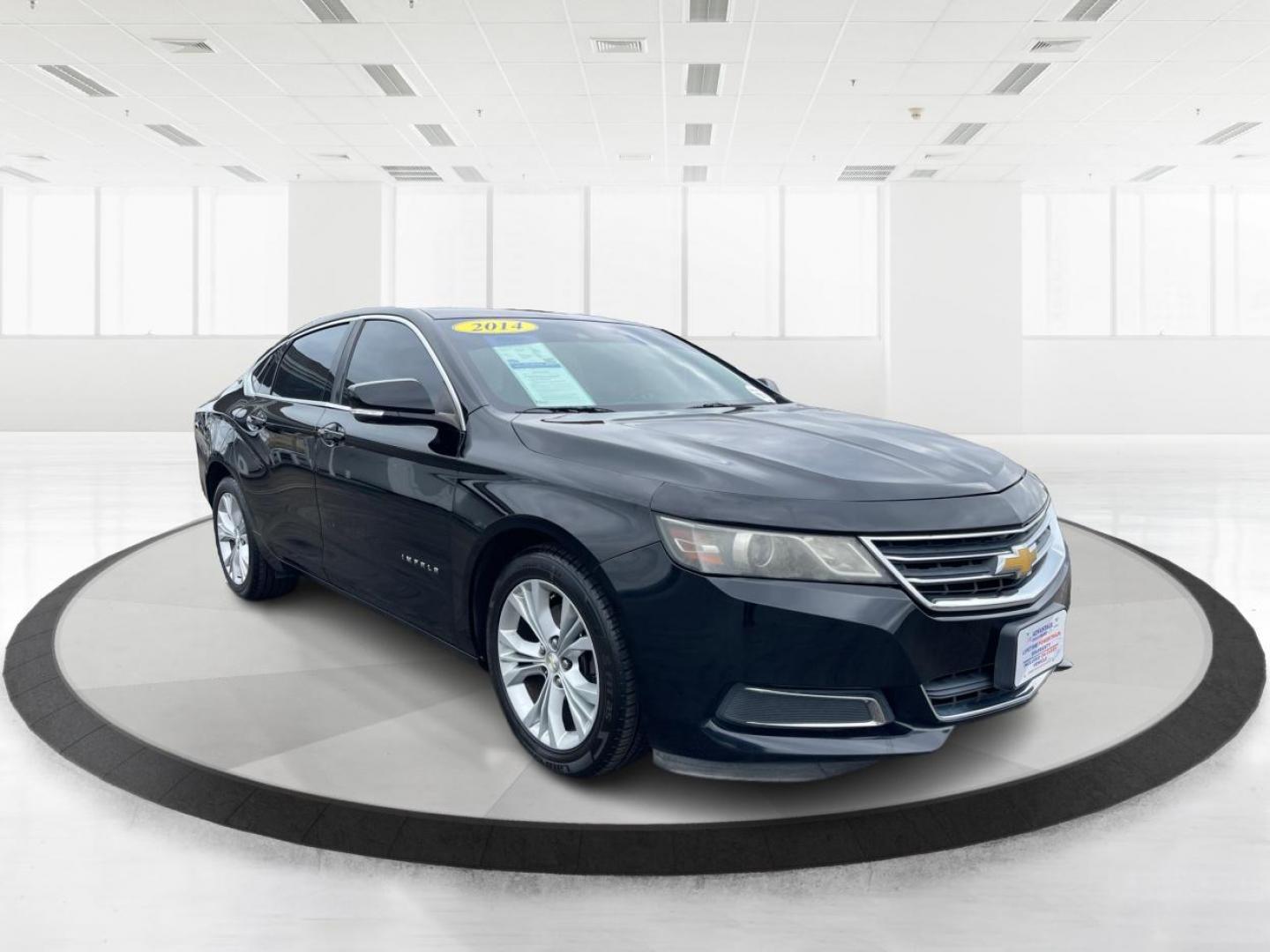 2014 Black Chevrolet Impala 2LT (2G1125S32E9) with an 3.6L V6 DOHC 24VV FFV engine, 6-Speed Automatic transmission, located at 1099 N County Rd 25A, Troy, OH, 45373, (937) 908-9800, 40.057079, -84.212883 - 2014 Chevrolet Impala 2LT - Photo#0