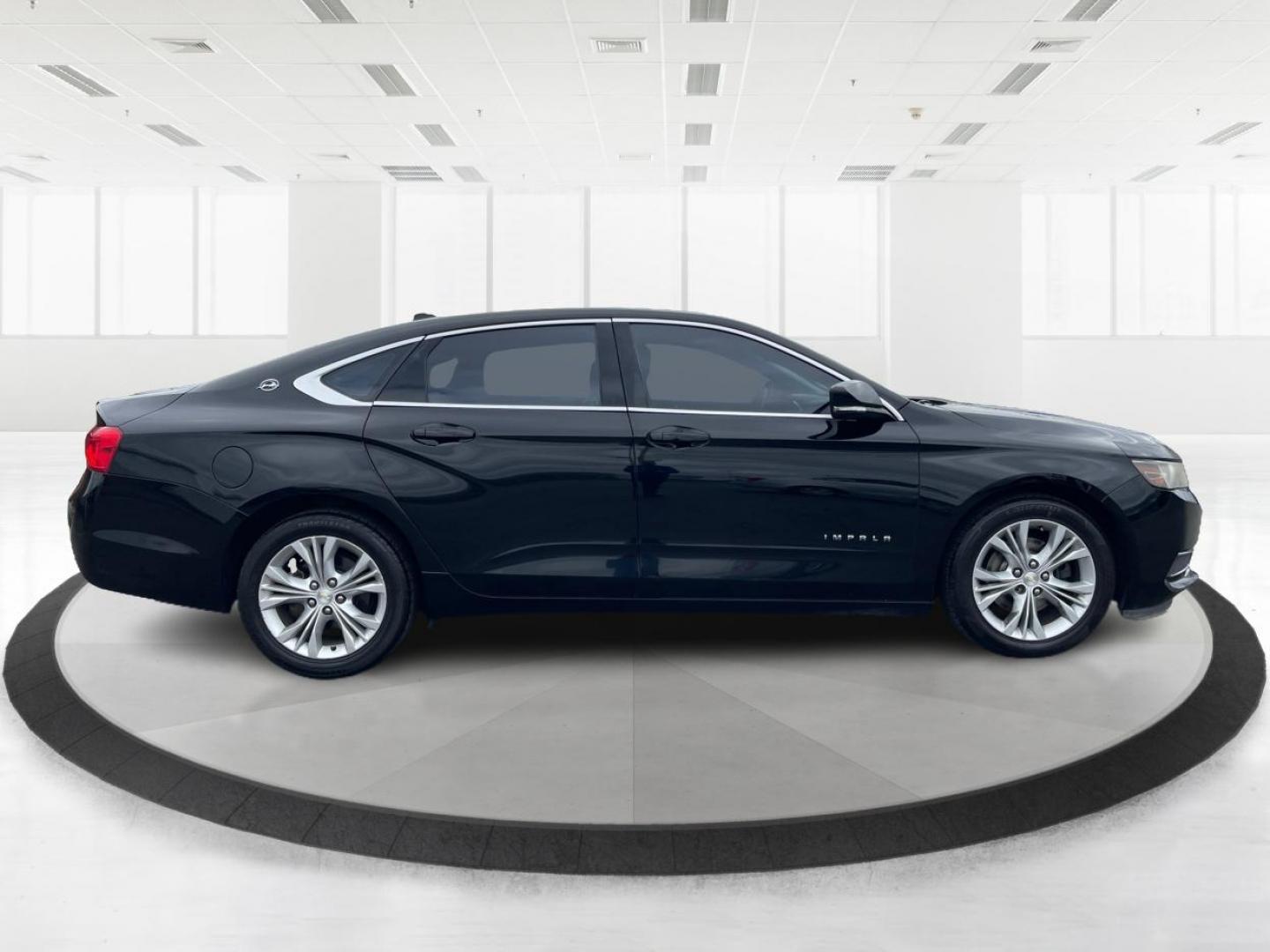 2014 Black Chevrolet Impala 2LT (2G1125S32E9) with an 3.6L V6 DOHC 24VV FFV engine, 6-Speed Automatic transmission, located at 1099 N County Rd 25A, Troy, OH, 45373, (937) 908-9800, 40.057079, -84.212883 - 2014 Chevrolet Impala 2LT - Photo#1