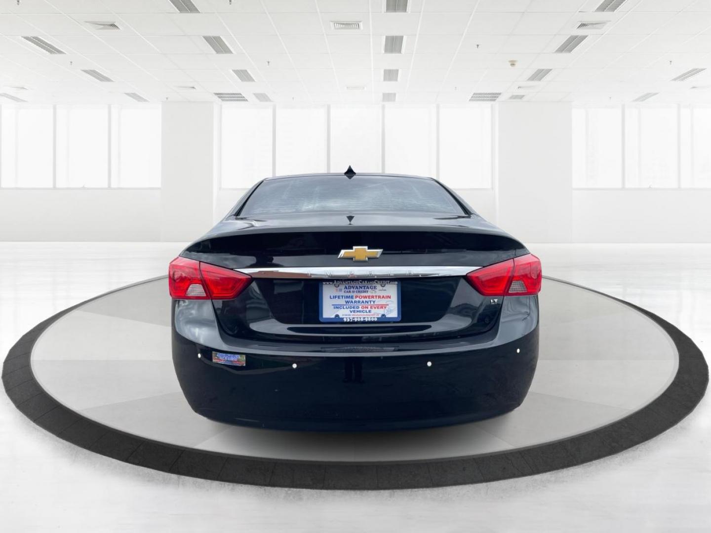 2014 Black Chevrolet Impala 2LT (2G1125S32E9) with an 3.6L V6 DOHC 24VV FFV engine, 6-Speed Automatic transmission, located at 1099 N County Rd 25A, Troy, OH, 45373, (937) 908-9800, 40.057079, -84.212883 - 2014 Chevrolet Impala 2LT - Photo#3