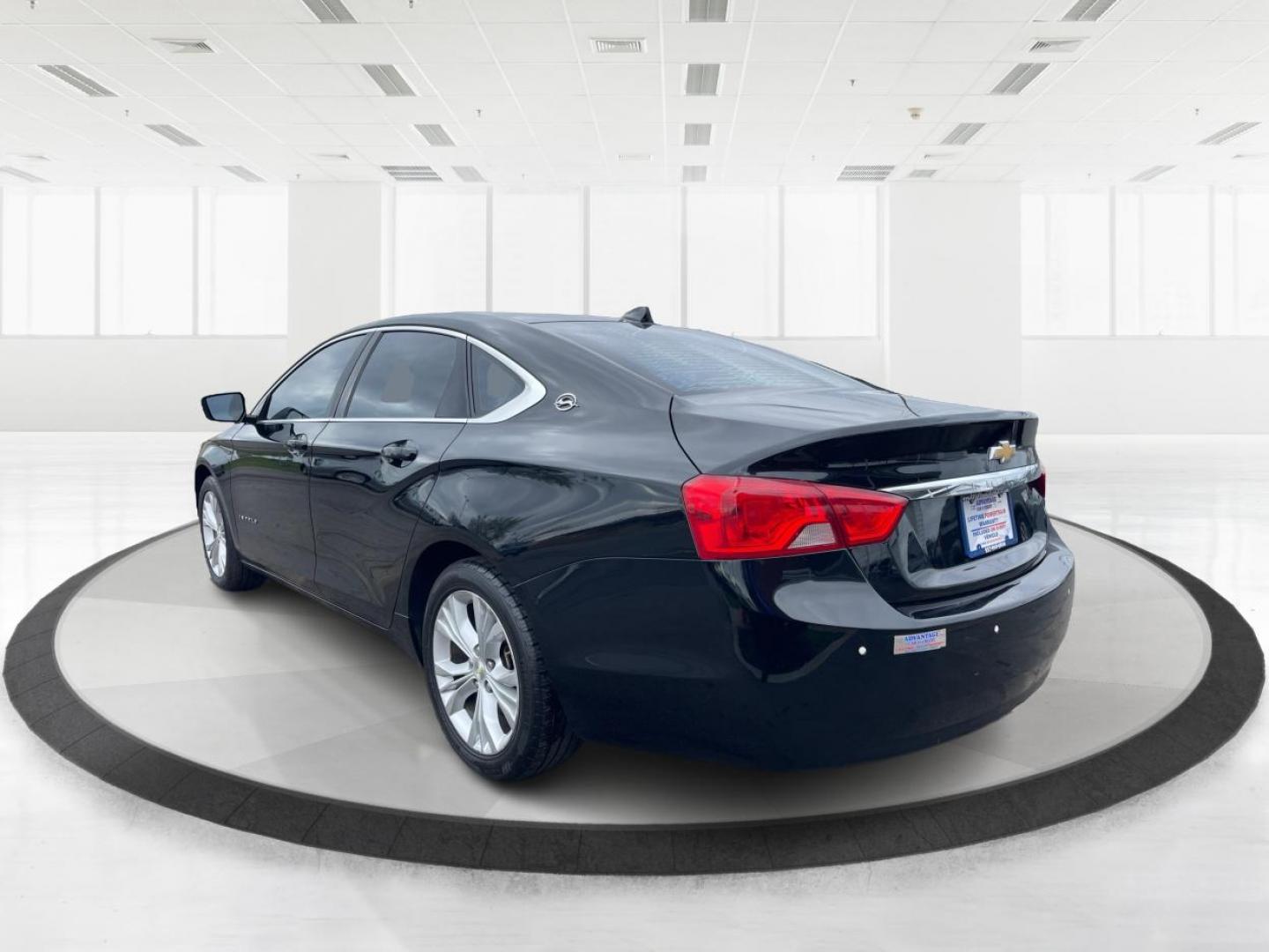 2014 Black Chevrolet Impala 2LT (2G1125S32E9) with an 3.6L V6 DOHC 24VV FFV engine, 6-Speed Automatic transmission, located at 1099 N County Rd 25A, Troy, OH, 45373, (937) 908-9800, 40.057079, -84.212883 - 2014 Chevrolet Impala 2LT - Photo#4