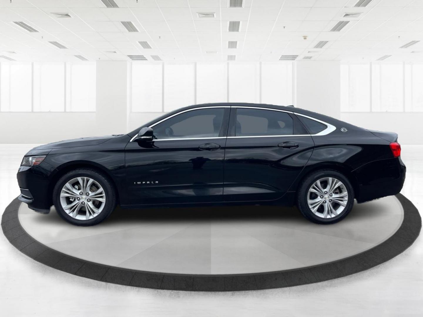 2014 Black Chevrolet Impala 2LT (2G1125S32E9) with an 3.6L V6 DOHC 24VV FFV engine, 6-Speed Automatic transmission, located at 1099 N County Rd 25A, Troy, OH, 45373, (937) 908-9800, 40.057079, -84.212883 - 2014 Chevrolet Impala 2LT - Photo#5