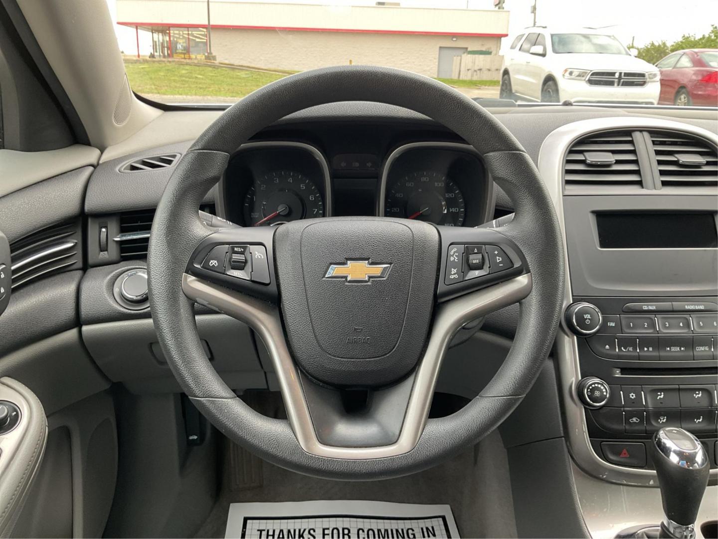 2014 Chevrolet Malibu 1LS (1G11B5SL5EU) with an ECOTEC 2.5L I-4 gasoline direct injection engine, located at 4508 South Dixie Dr, Moraine, OH, 45439, (937) 908-9800, 39.689976, -84.218452 - 2014 Chevrolet Malibu 1LS - Photo#12