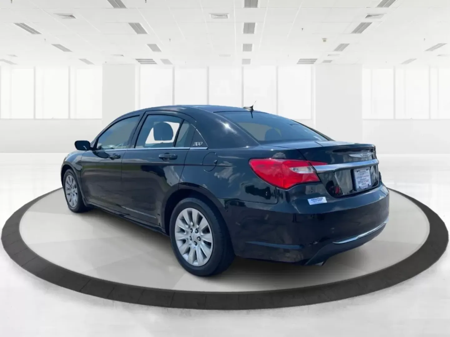 2014 Chrysler 200 LX (1C3CCBAG7EN) with an Other engine, located at 880 E. National Road, Vandalia, OH, 45377, (937) 908-9800, 39.891918, -84.183594 - Are you looking for a reliable car that seamlessly fits into your busy lifestyle? Look no further than this stunning 2014 Chrysler 200 LX, available now at Advantage Car and Credit in Fairborn, OH. This stylish sedan is perfect for growing families, daily commuters, or anyone seeking a dependable ve - Photo#4
