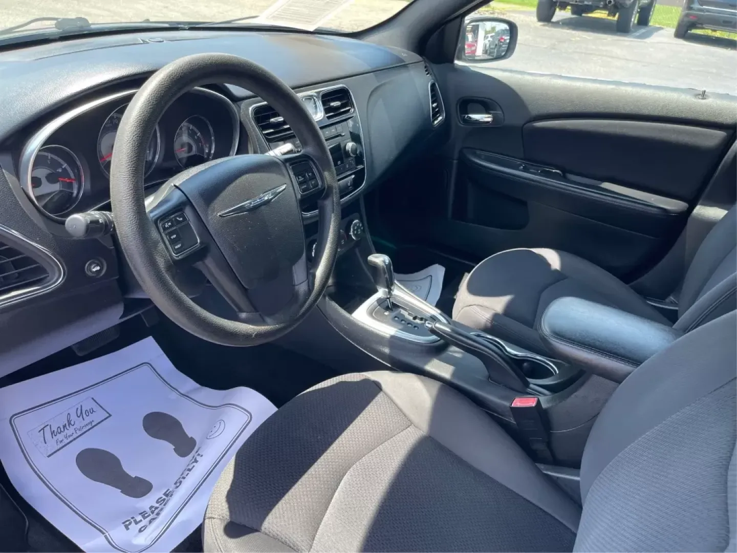 2014 Chrysler 200 LX (1C3CCBAG7EN) with an Other engine, located at 880 E. National Road, Vandalia, OH, 45377, (937) 908-9800, 39.891918, -84.183594 - Are you looking for a reliable car that seamlessly fits into your busy lifestyle? Look no further than this stunning 2014 Chrysler 200 LX, available now at Advantage Car and Credit in Fairborn, OH. This stylish sedan is perfect for growing families, daily commuters, or anyone seeking a dependable ve - Photo#8