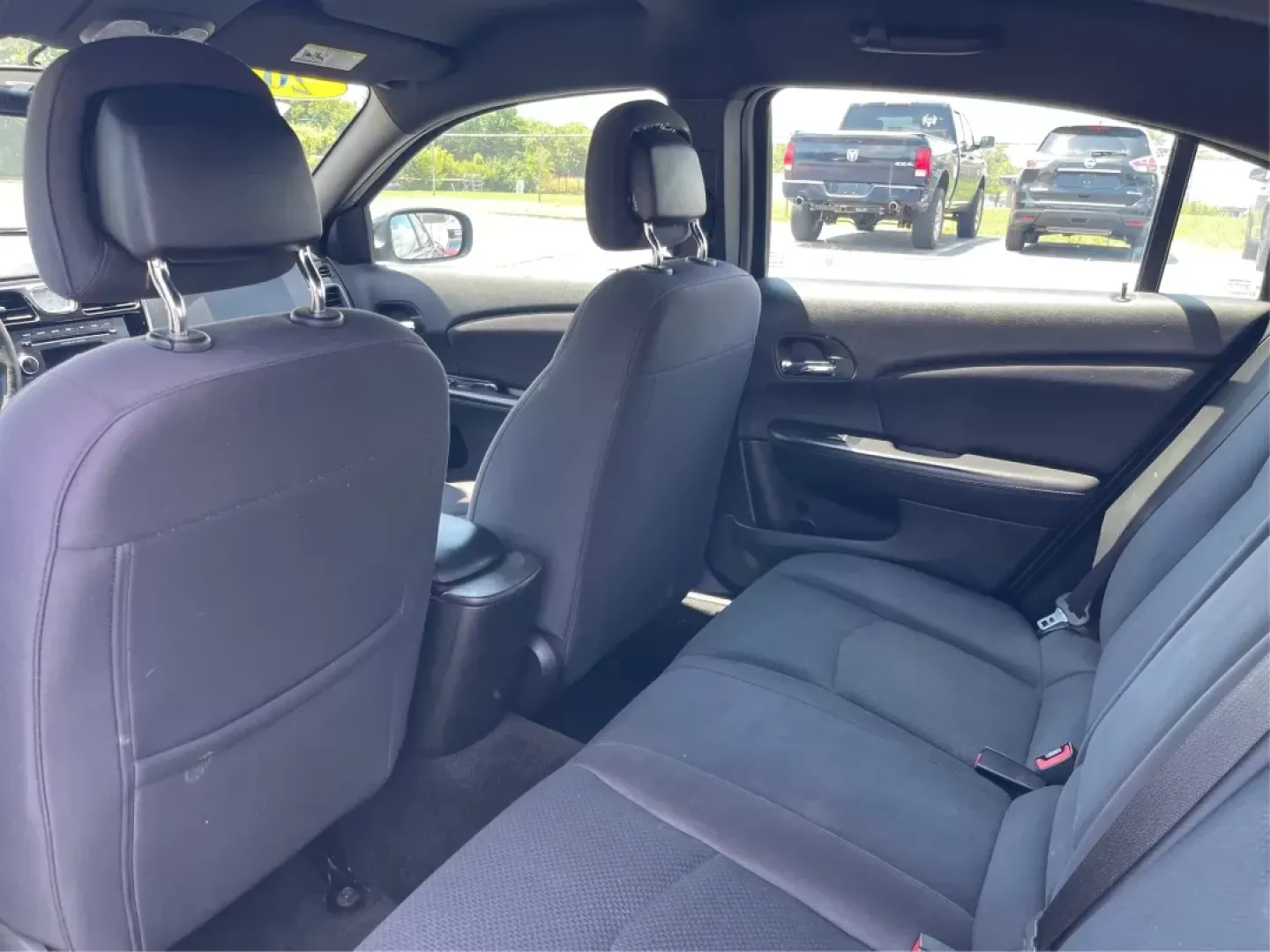 2014 Chrysler 200 LX (1C3CCBAG7EN) with an Other engine, located at 880 E. National Road, Vandalia, OH, 45377, (937) 908-9800, 39.891918, -84.183594 - Are you looking for a reliable car that seamlessly fits into your busy lifestyle? Look no further than this stunning 2014 Chrysler 200 LX, available now at Advantage Car and Credit in Fairborn, OH. This stylish sedan is perfect for growing families, daily commuters, or anyone seeking a dependable ve - Photo#9