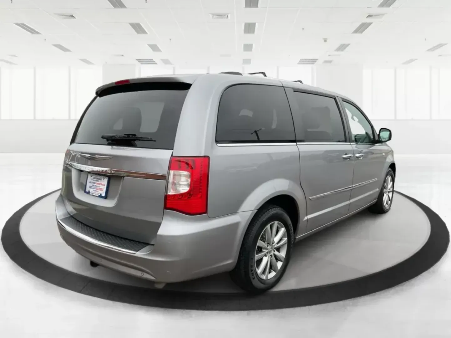 2014 Chrysler Town and Country Touring-L 30th Anniversary (2C4RC1CG7ER) with an Pentastar 3.6L V-6 DOHC engine, located at 1184 Kauffman Ave, Fairborn, OH, 45324, (937) 908-9800, 39.807072, -84.030914 - 2014 Chrysler Town and Country Touring-L 30th Anniversary - Photo#2