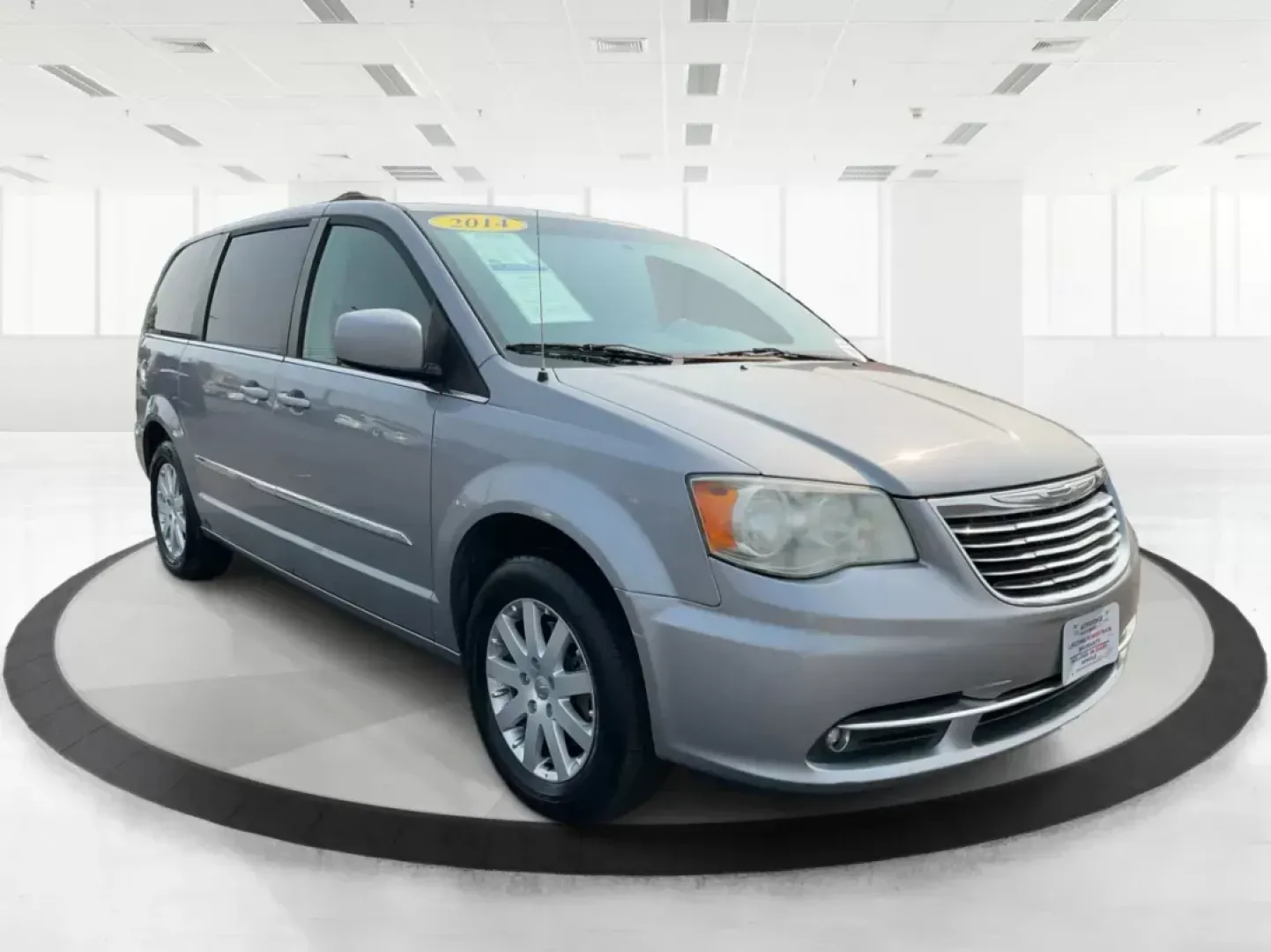 2014 Chrysler Town and Country Touring (2C4RC1BG3ER) with an 3.6L V6 DOHC 24V engine, 6-Speed Automatic transmission, located at 8750 N County Rd 25A, Piqua, OH, 45356, (937) 908-9800, 40.164391, -84.232513 - Elevate your family's adventures with the 2014 Chrysler Town and Country Touring van, available now at Advantage Car and Credit in Fairborn, OH. This spacious and versatile vehicle is perfect for growing families, weekend trips, or anyone looking for the ultimate comfort in commuting. With ample s - Photo#0