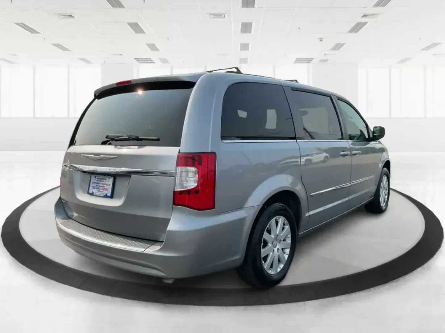 2014 Chrysler Town and Country Touring (2C4RC1BG3ER) with an 3.6L V6 DOHC 24V engine, 6-Speed Automatic transmission, located at 8750 N County Rd 25A, Piqua, OH, 45356, (937) 908-9800, 40.164391, -84.232513 - Elevate your family's adventures with the 2014 Chrysler Town and Country Touring van, available now at Advantage Car and Credit in Fairborn, OH. This spacious and versatile vehicle is perfect for growing families, weekend trips, or anyone looking for the ultimate comfort in commuting. With ample s - Photo#2