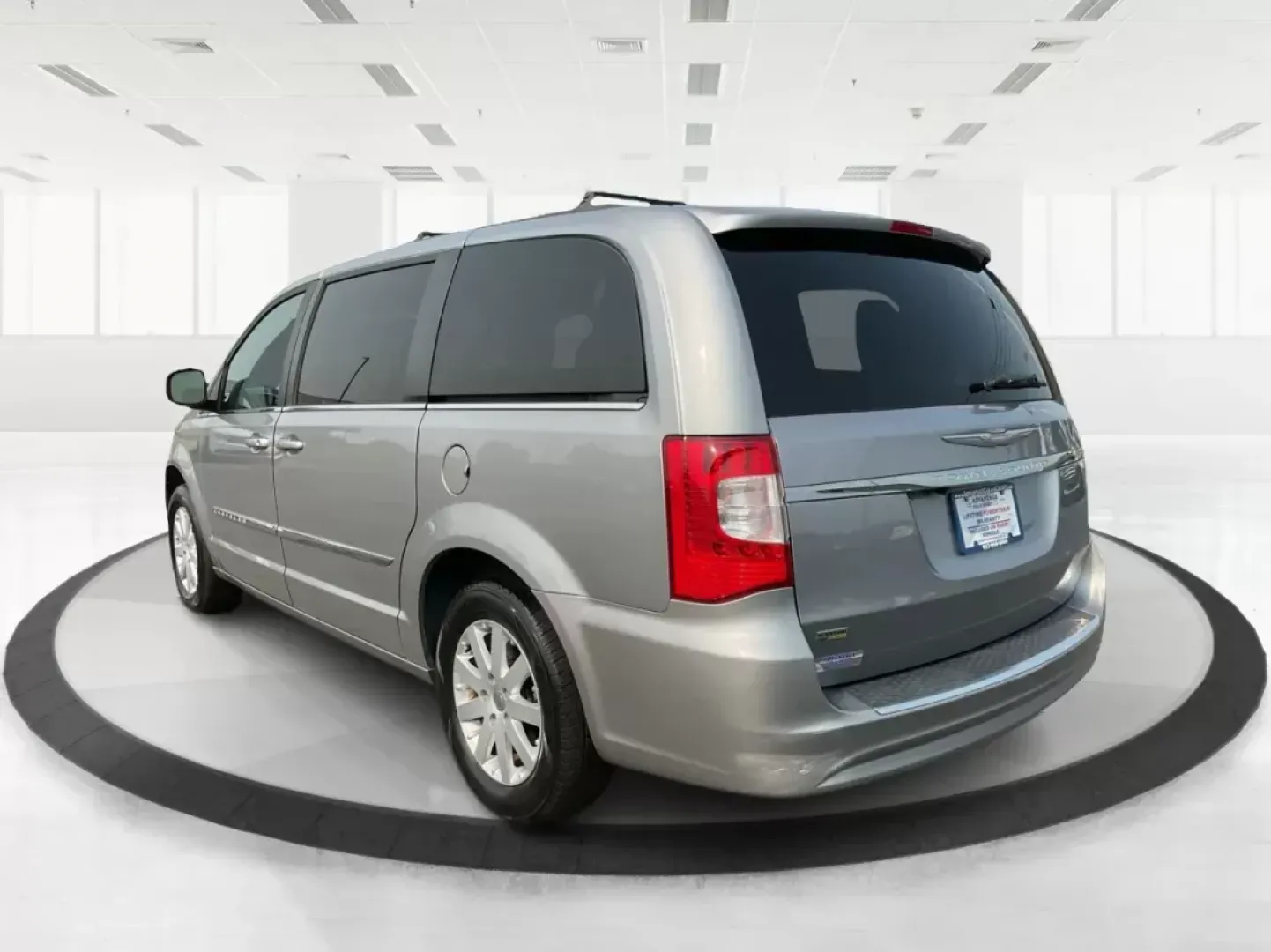2014 Chrysler Town and Country Touring (2C4RC1BG3ER) with an 3.6L V6 DOHC 24V engine, 6-Speed Automatic transmission, located at 8750 N County Rd 25A, Piqua, OH, 45356, (937) 908-9800, 40.164391, -84.232513 - Elevate your family's adventures with the 2014 Chrysler Town and Country Touring van, available now at Advantage Car and Credit in Fairborn, OH. This spacious and versatile vehicle is perfect for growing families, weekend trips, or anyone looking for the ultimate comfort in commuting. With ample s - Photo#4