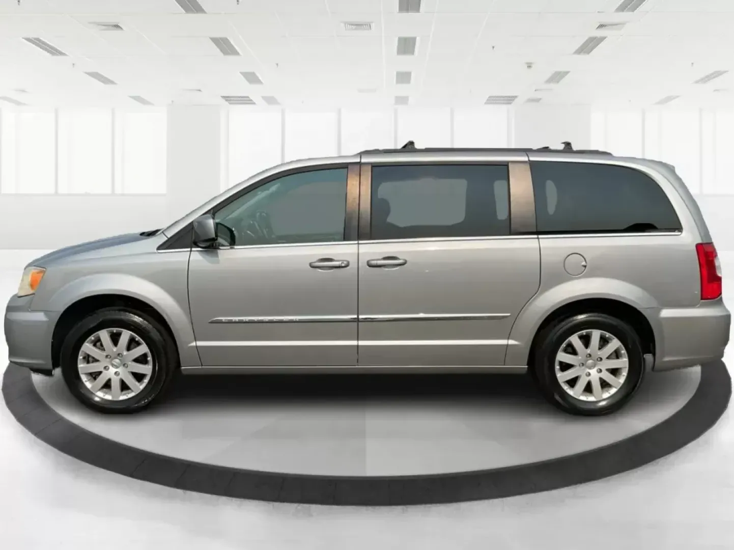2014 Chrysler Town and Country Touring (2C4RC1BG3ER) with an 3.6L V6 DOHC 24V engine, 6-Speed Automatic transmission, located at 8750 N County Rd 25A, Piqua, OH, 45356, (937) 908-9800, 40.164391, -84.232513 - Elevate your family's adventures with the 2014 Chrysler Town and Country Touring van, available now at Advantage Car and Credit in Fairborn, OH. This spacious and versatile vehicle is perfect for growing families, weekend trips, or anyone looking for the ultimate comfort in commuting. With ample s - Photo#5