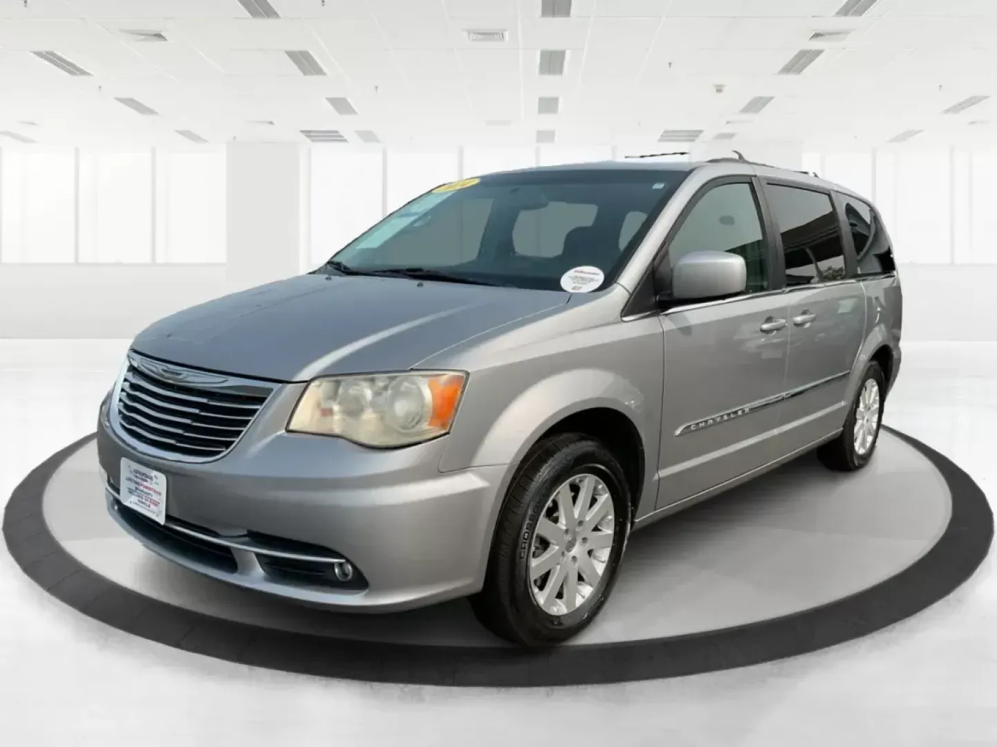 2014 Chrysler Town and Country Touring (2C4RC1BG3ER) with an 3.6L V6 DOHC 24V engine, 6-Speed Automatic transmission, located at 8750 N County Rd 25A, Piqua, OH, 45356, (937) 908-9800, 40.164391, -84.232513 - Elevate your family's adventures with the 2014 Chrysler Town and Country Touring van, available now at Advantage Car and Credit in Fairborn, OH. This spacious and versatile vehicle is perfect for growing families, weekend trips, or anyone looking for the ultimate comfort in commuting. With ample s - Photo#7