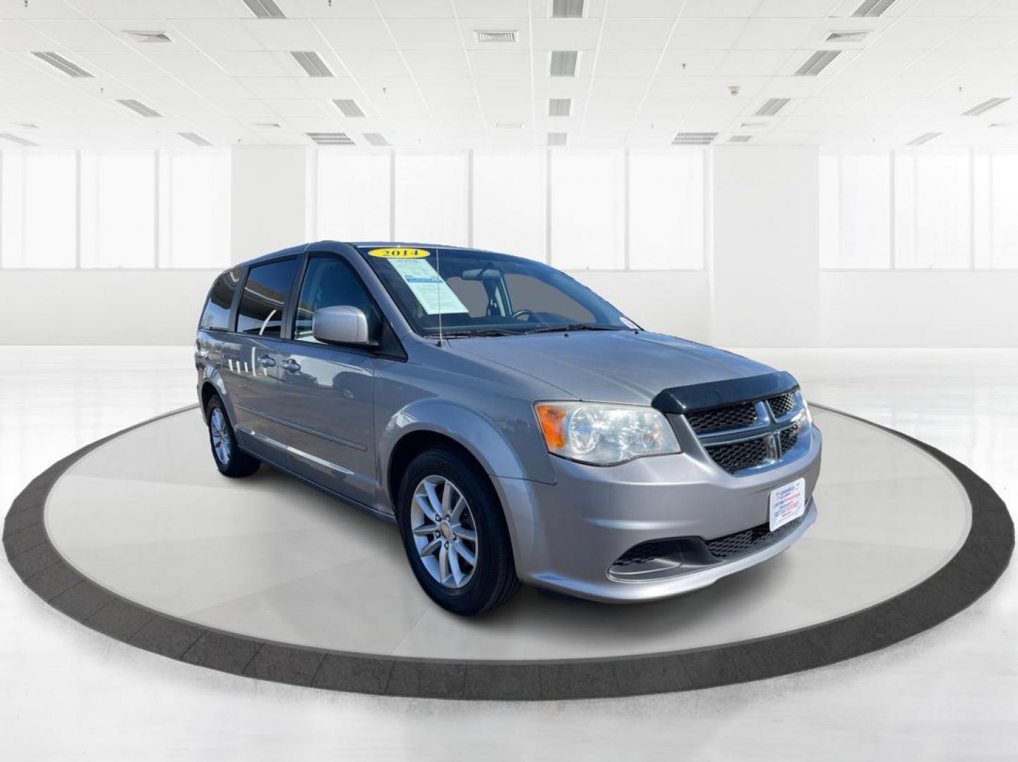 2014 Dodge Grand Caravan SXT (2C4RDGCG4ER) with an 3.6L V-6 DOHC engine, located at 880 E. National Road, Vandalia, OH, 45377, (937) 908-9800, 39.891918, -84.183594 - 2014 Dodge Grand Caravan SXT - Photo#0