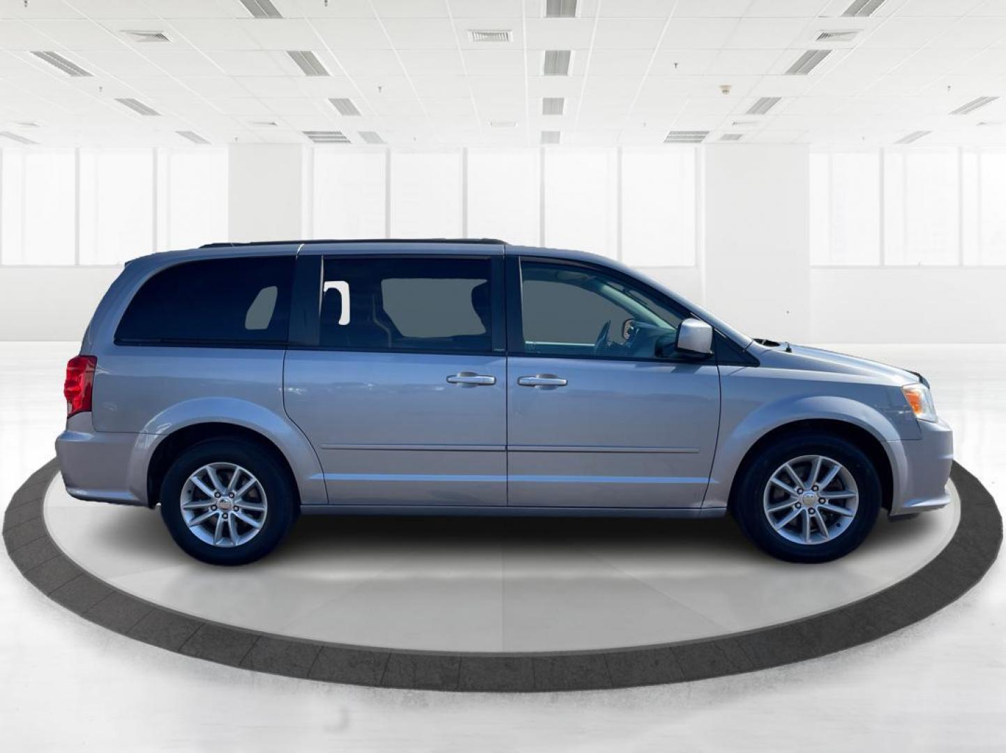 2014 Dodge Grand Caravan SXT (2C4RDGCG4ER) with an 3.6L V-6 DOHC engine, located at 880 E. National Road, Vandalia, OH, 45377, (937) 908-9800, 39.891918, -84.183594 - 2014 Dodge Grand Caravan SXT - Photo#1