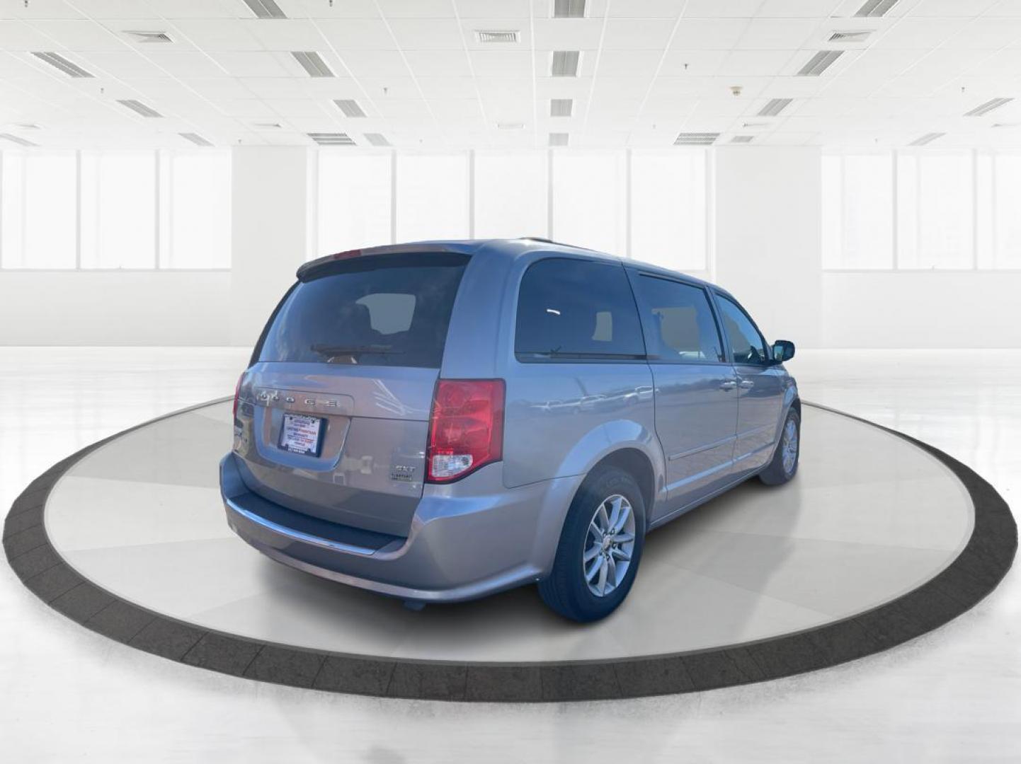 2014 Dodge Grand Caravan SXT (2C4RDGCG4ER) with an 3.6L V-6 DOHC engine, located at 880 E. National Road, Vandalia, OH, 45377, (937) 908-9800, 39.891918, -84.183594 - 2014 Dodge Grand Caravan SXT - Photo#2
