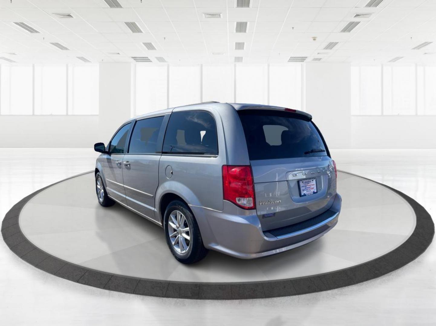 2014 Dodge Grand Caravan SXT (2C4RDGCG4ER) with an 3.6L V-6 DOHC engine, located at 880 E. National Road, Vandalia, OH, 45377, (937) 908-9800, 39.891918, -84.183594 - 2014 Dodge Grand Caravan SXT - Photo#4