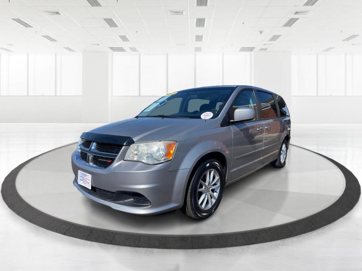 2014 Dodge Grand Caravan SXT (2C4RDGCG4ER) with an 3.6L V-6 DOHC engine, located at 880 E. National Road, Vandalia, OH, 45377, (937) 908-9800, 39.891918, -84.183594 - 2014 Dodge Grand Caravan SXT - Photo#7