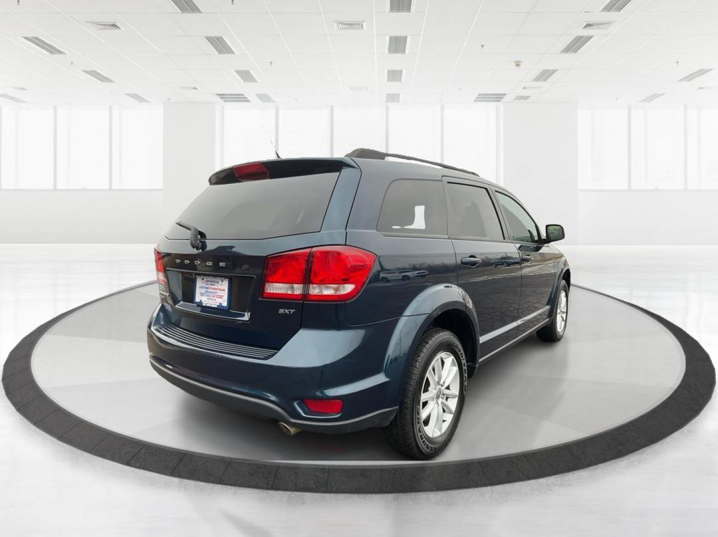 2014 Dodge Journey SXT AWD (3C4PDDBGXET) with an Other engine, located at 8750 N County Rd 25A, Piqua, OH, 45356, (937) 908-9800, 40.164391, -84.232513 - 2014 Dodge Journey SXT AWD - Photo#2