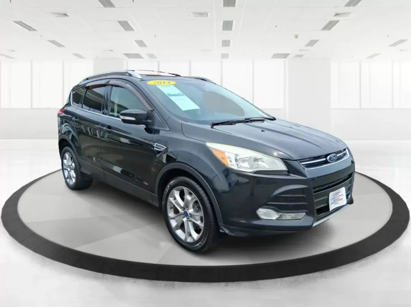 2014 Ford Escape Titanium (1FMCU9J96EU) with an EcoBoost 1.6L I-4 gasoline direct injection engine, located at 4508 South Dixie Dr, Moraine, OH, 45439, (937) 908-9800, 39.689976, -84.218452 - **Unleash Adventure with the 2014 Ford Escape Titanium: Your Ideal Family SUV!**<br /> <br /> Are you ready to take on the open road for your next family getaway or weekend adventure? Look no further than the 2014 Ford Escape Titanium, a versatile SUV that combines style, comfort, and functionality, - Photo#0