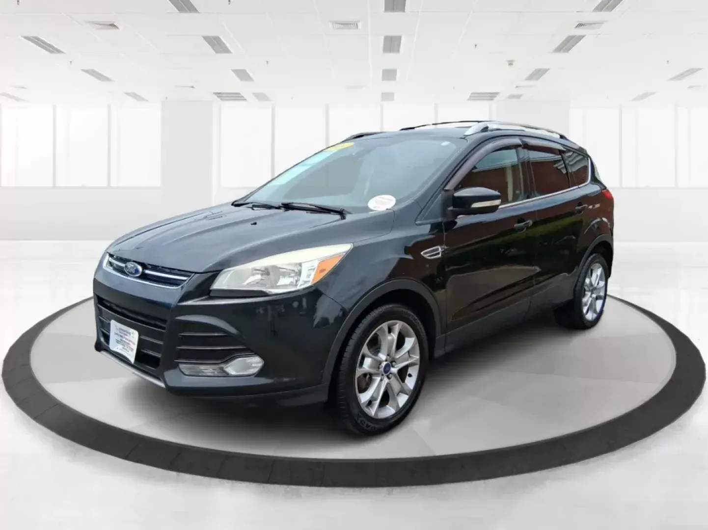 2014 Ford Escape Titanium (1FMCU9J96EU) with an EcoBoost 1.6L I-4 gasoline direct injection engine, located at 4508 South Dixie Dr, Moraine, OH, 45439, (937) 908-9800, 39.689976, -84.218452 - **Unleash Adventure with the 2014 Ford Escape Titanium: Your Ideal Family SUV!**<br /> <br /> Are you ready to take on the open road for your next family getaway or weekend adventure? Look no further than the 2014 Ford Escape Titanium, a versatile SUV that combines style, comfort, and functionality, - Photo#7