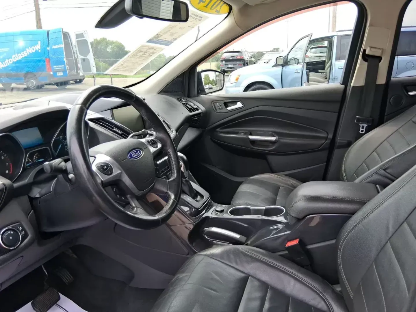 2014 Ford Escape Titanium (1FMCU9J96EU) with an EcoBoost 1.6L I-4 gasoline direct injection engine, located at 4508 South Dixie Dr, Moraine, OH, 45439, (937) 908-9800, 39.689976, -84.218452 - **Unleash Adventure with the 2014 Ford Escape Titanium: Your Ideal Family SUV!**<br /> <br /> Are you ready to take on the open road for your next family getaway or weekend adventure? Look no further than the 2014 Ford Escape Titanium, a versatile SUV that combines style, comfort, and functionality, - Photo#8